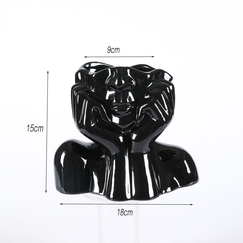 Kleine Figuren-Vase